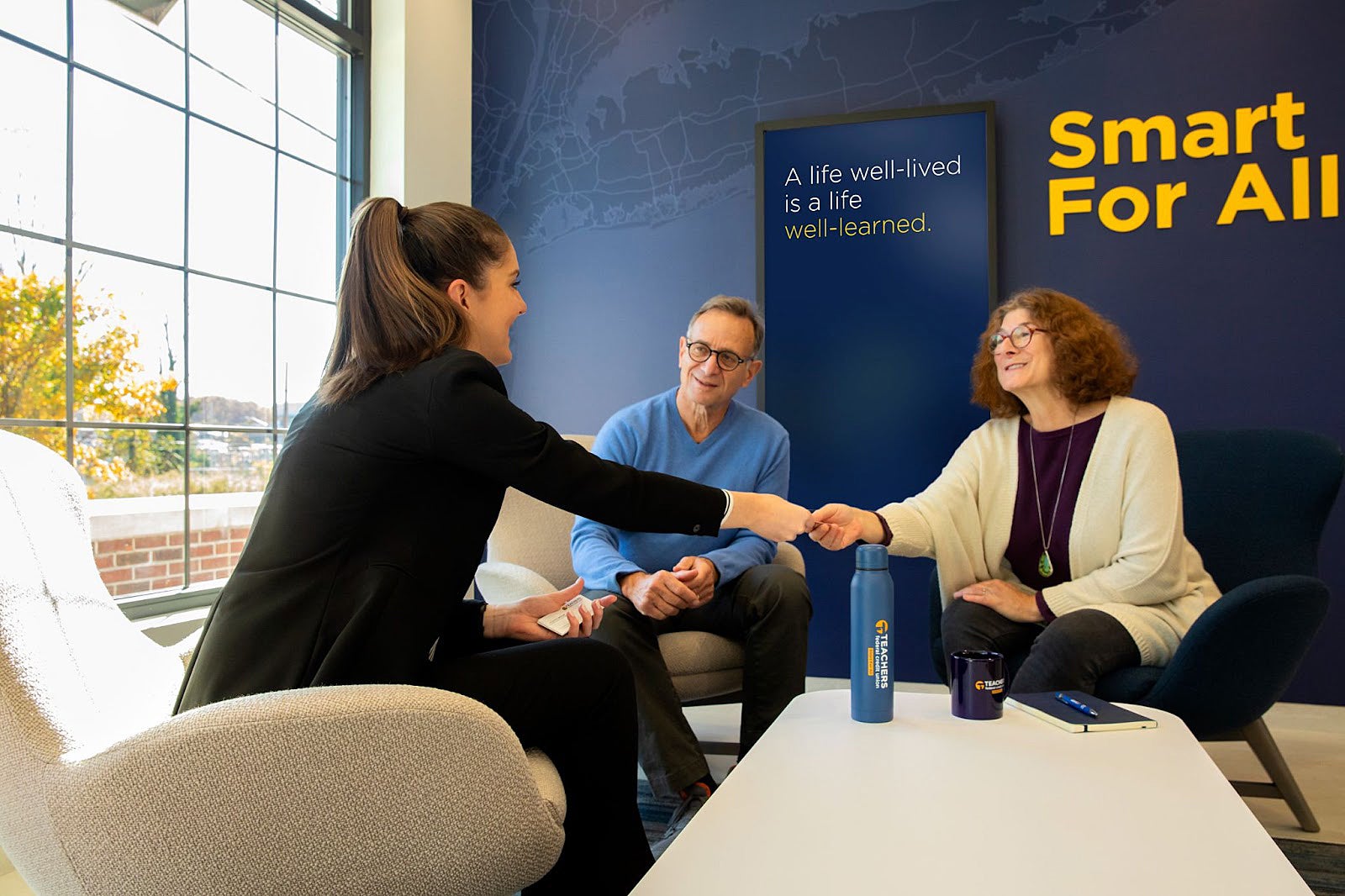 Teachers Federal Credit Union employee providing excellent member service as a part of the credit union philosophy.