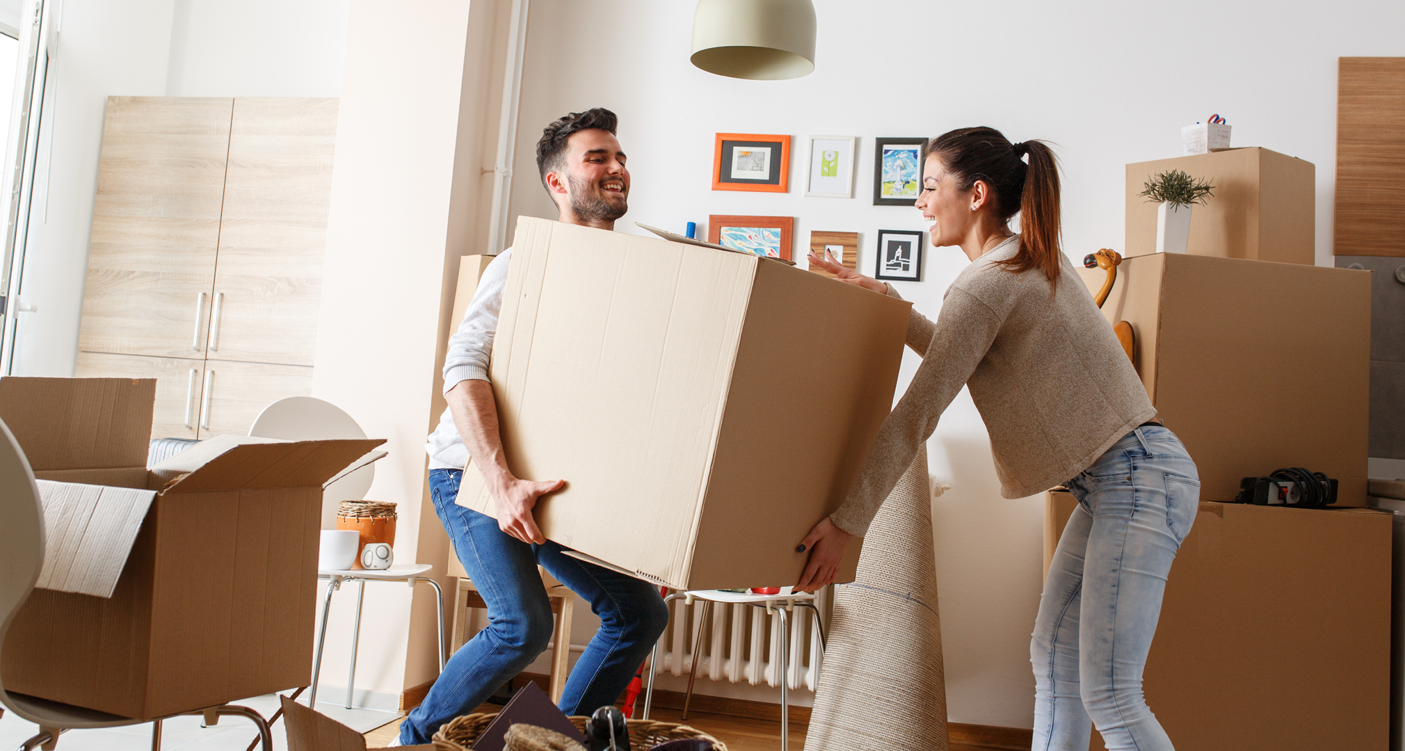 First time homebuyer couple moving in to new house