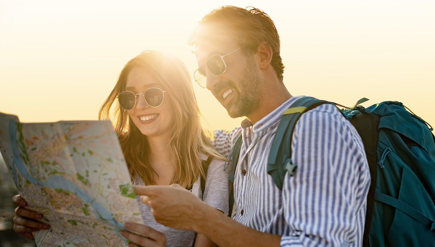 Man and woman looking at a map