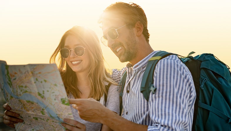 Man and woman looking at a map