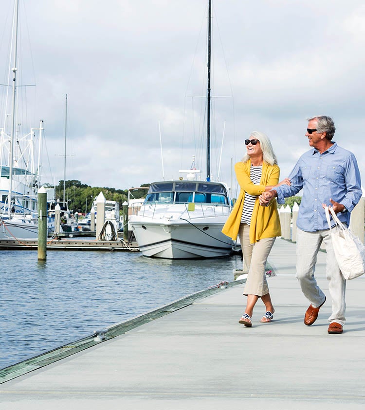 Couple walking on a dock