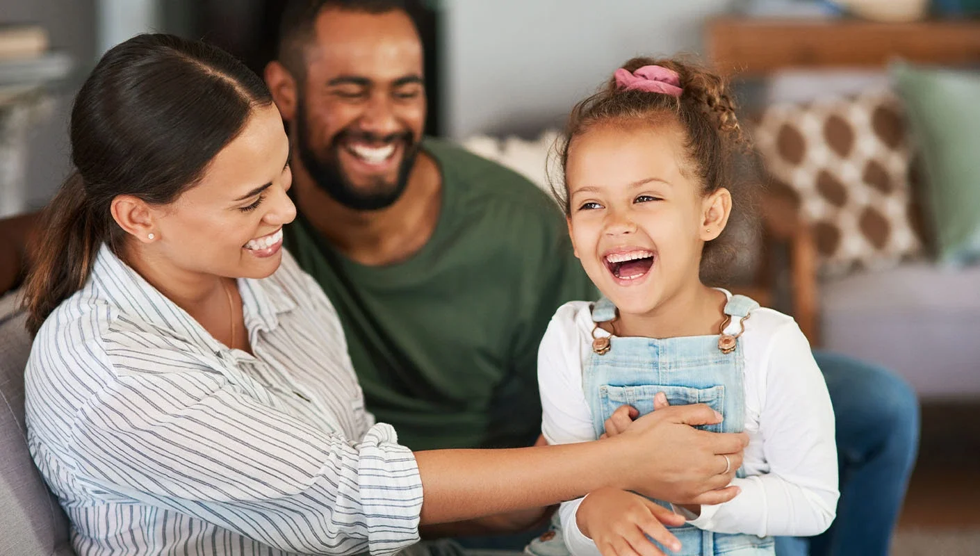 A family interacts in their new home