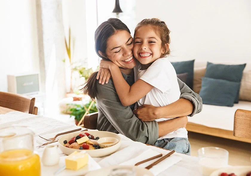 A mother and child enjoy their new home