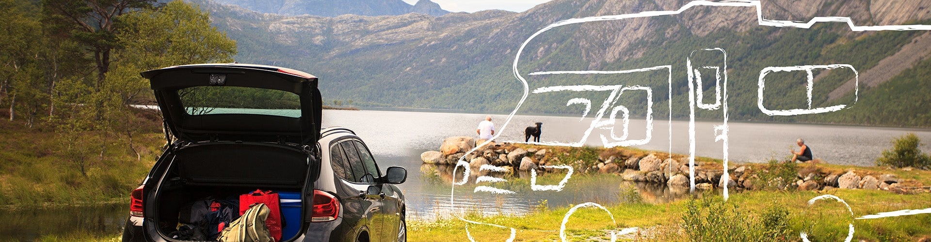 RV by the water and mountains